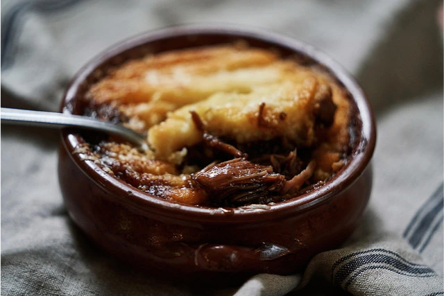 Parmentier de canard confit : une recette gourmande à la purée de pomme de terre